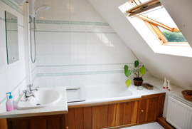 Bathroom with hand made oak fitted cupboards